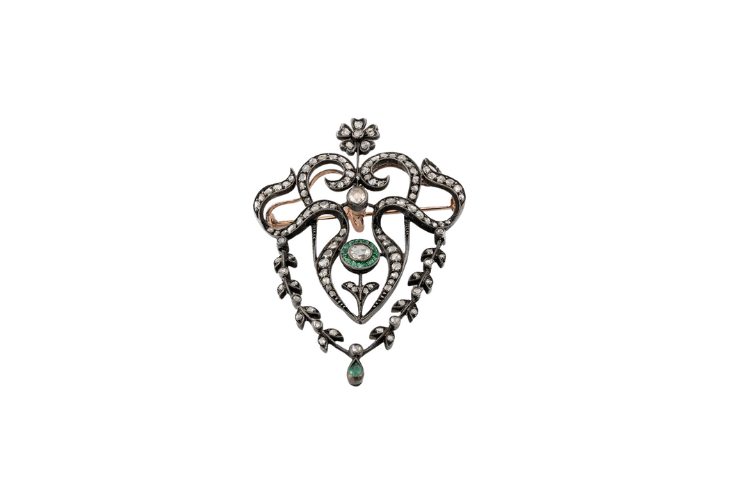 Gold brooch and silver with diamonds and emeralds