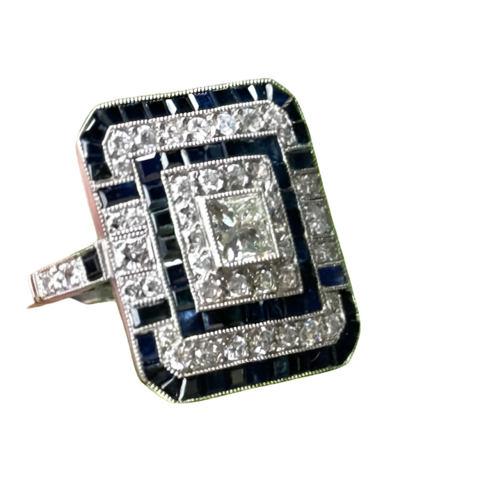 Art Deco stijlring met diamanten en saffieren.