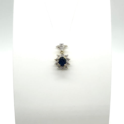 Pendentif Pendentif bicolore en or jaune et blanc avec saphir et diamants 58 Facettes Z1351722