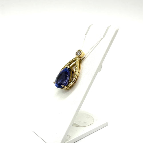 Pendentif Pendentif en or jaune 750 avec tanzanite et diamant 58 Facettes Z15B51652