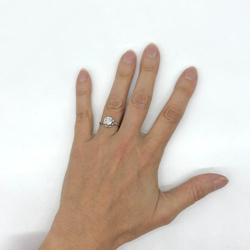 Bague 54 Bague solitaire accompagné en or blanc 18 carats et diamants 58 Facettes Z15B51673