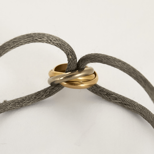 CARTIER - TRinity - Bracelet cordon et pendentif trois ors