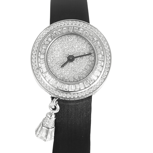 VAN CLEEF & ARPELS - Montre en or blanc et diamants à boitier rond et mouvement quartz 58 Facettes DV19552-1