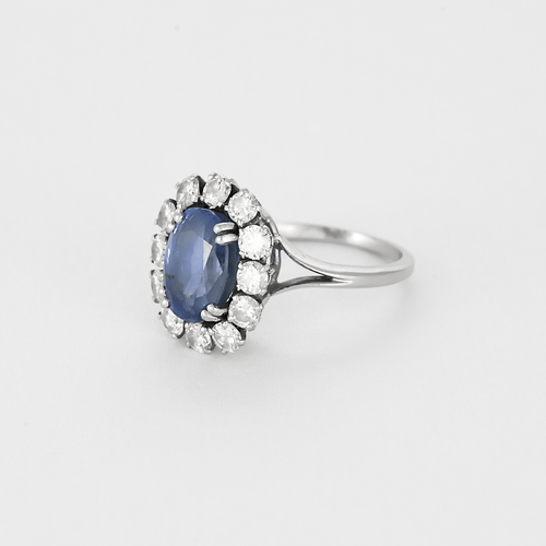 Bague marguerite en or gris saphir et diamants