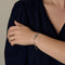 Bracelet Dinh Van Menottes R10 - Bracelet en or gris, Diamants 58 Facettes DV21154-1