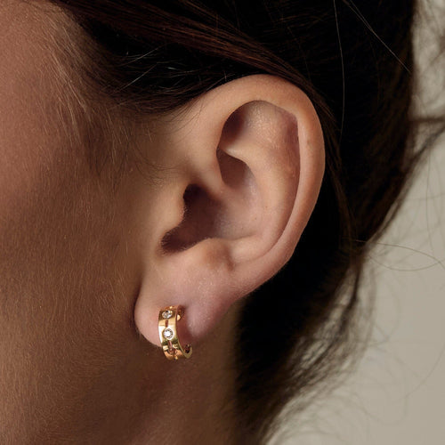 Boucles d'oreilles DINH VAN - Mono Créole Pulse en or jaune et diamants 58 Facettes DDV21222-1