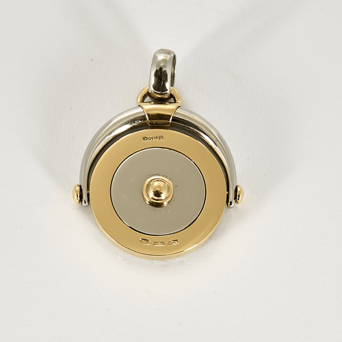 BULGARI - TONDO Zodiak - Přívěsek ze žlutého zlata a oceli.