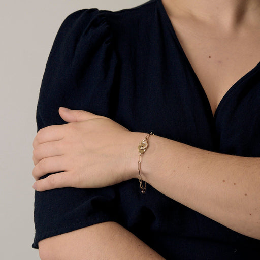 Dinh Van Menottes R10 Armband aus Gelbgold und Diamanten