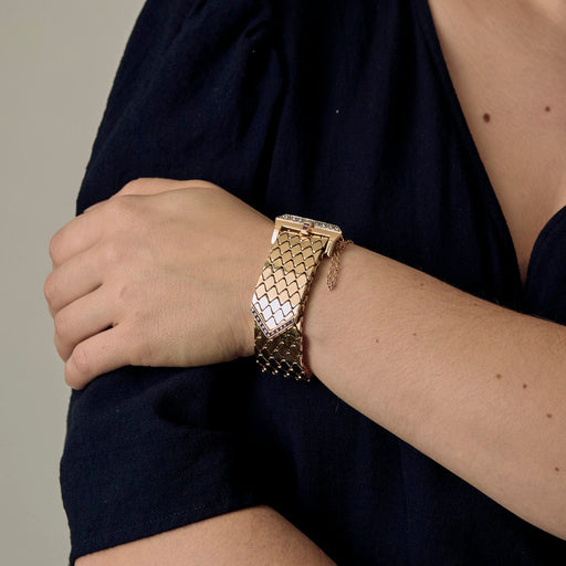 Zarif sarı altın şerit bileklik, pırlantalar ve yakutlar