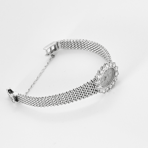 OMEGA - Damklocka i vitt guld och diamanter