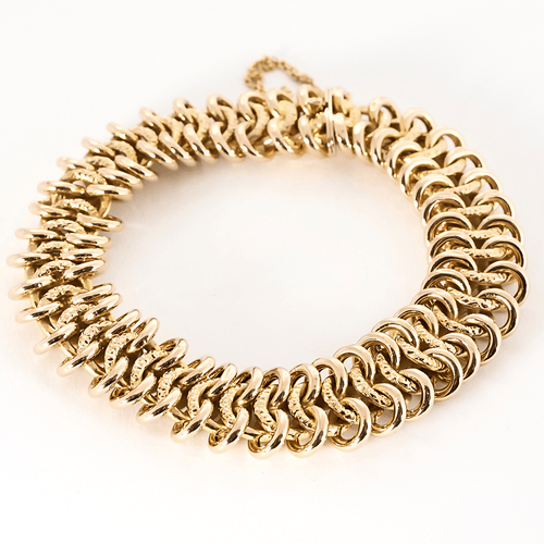 Armband aus Roségold mit Kettenglied fantasievoll ziseliert