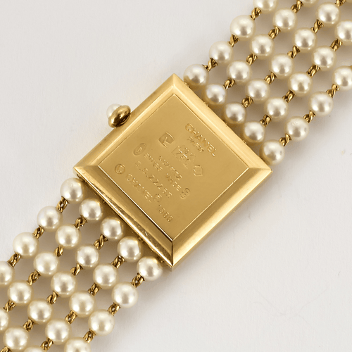 CHANEL - Mademoiselle - Montre bijou or jaune et perles 58 Facettes DV23243-1