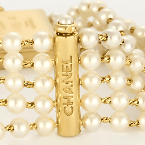 CHANEL - Mademoiselle - Montre bijou or jaune et perles 58 Facettes DV23243-1