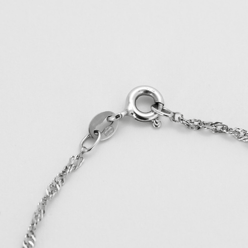 Náhrdelník z bílého zlata s přívěskem z topazu a diamantů