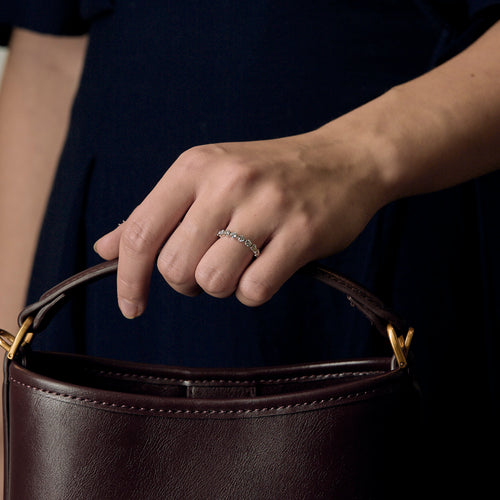 Half Wedding band in white gold and diamonds