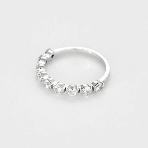 Half Wedding band in white gold and diamonds