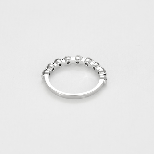 Half Wedding band in white gold and diamonds