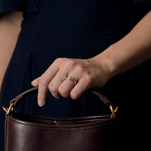 Trilogy ring in white gold and diamonds