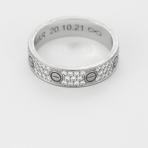 CARTIER - Love Bague - Petit Modèle - en or gris et diamants.