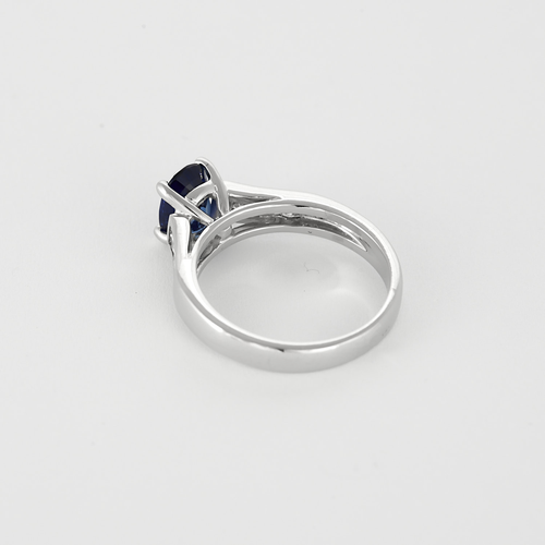 Bague en or gris saphir et diamants