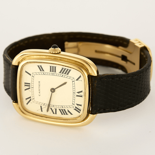 CARTIER - Gondole Jumbo - Montre en or jaune à cadran tonneau et mouvement mécanique à remontage manuel