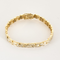 Bracelet en or jaune articulé et diamants