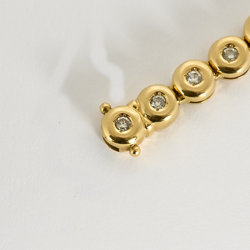 Armbånd i gult gull og diamanter