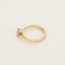 Anillo aro de oro amarillo y zafiro rosa sintético