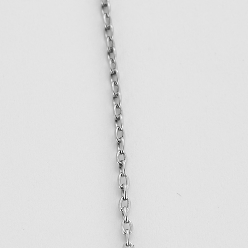 Necklace in grey gold, platinum and three diamonds.