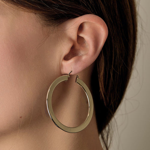 Boucles d'oreilles Paire de créole contemporaine en or gris 58 Facettes DV12008-1