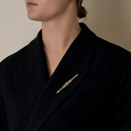 Spona brož ve žlutém a šedém zlatě, diamant starého brusu, růžově broušené diamanty.