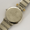 VAN CLEEF & ARPELS - Steel and gold-plated steel watch with round case and quartz movement