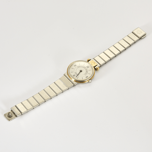 VAN CLEEF & ARPELS - Steel and gold-plated steel watch with round case and quartz movement