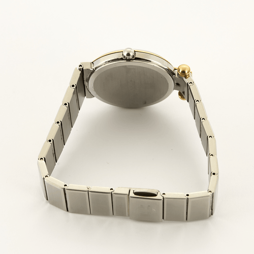 VAN CLEEF & ARPELS - Steel and gold-plated steel watch with round case and quartz movement