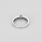 Bague solitaire en or gris et diamants