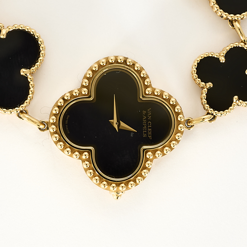 VAN CLEEF & ARPELS - Alhambra - Montre bracelet de dame en or jaune et onyx