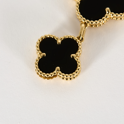 VAN CLEEF & ARPELS - Alhambra - Montre bracelet de dame en or jaune et onyx