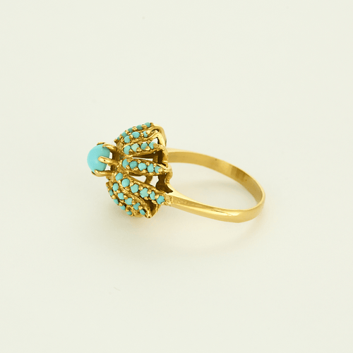 Anel em ouro amarelo com motivo de flores e turquesas