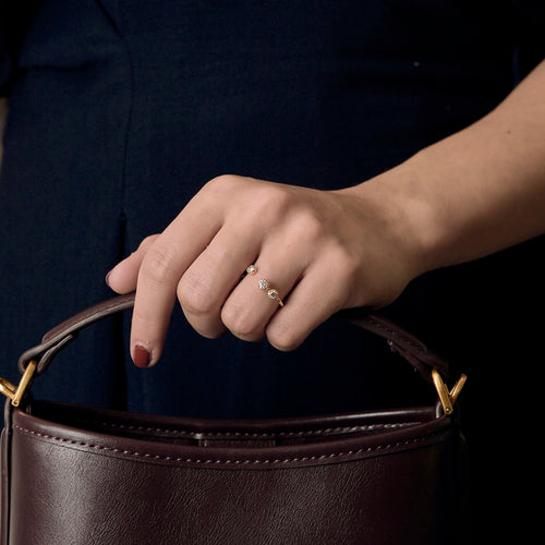 Open yellow gold and diamond ring