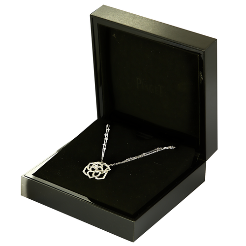 PIAGET -  Rose - Collier pendentif en or gris et diamants