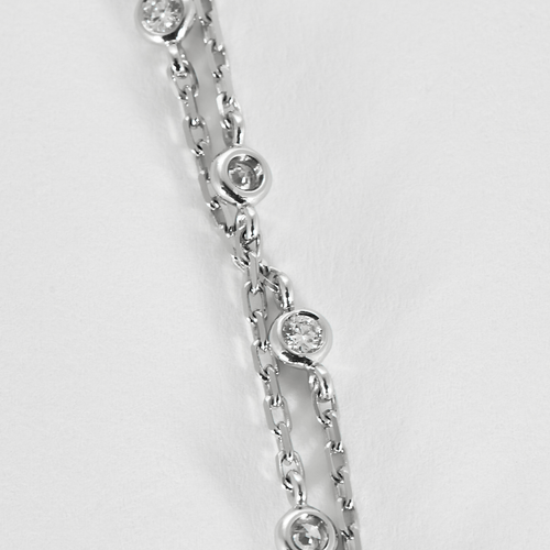PIAGET -  Rose - Collier pendentif en or gris et diamants
