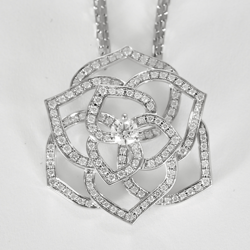 PIAGET -  Rose - Collier pendentif en or gris et diamants