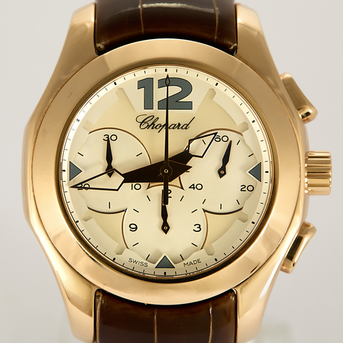 CHOPARD - ELTON JOHN - Montre en or rose à boitier rond à mouvement chronographe automatique