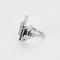 Modernist ring in white gold, diamonds and calibrated sapphires