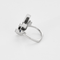 Modernist ring in white gold, diamonds and calibrated sapphires