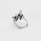 Modernist ring in white gold, diamonds and calibrated sapphires