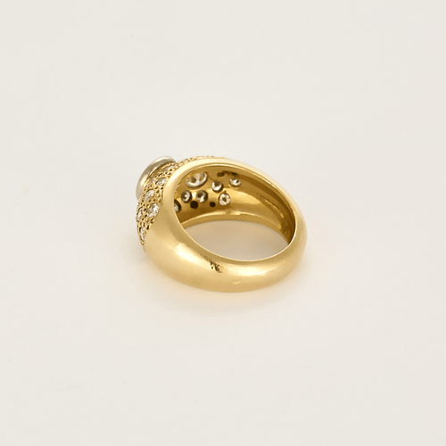 Armring i gult guld og hvidguld, diamanter.