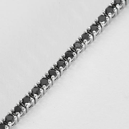 Bracelet en or blanc et diamants noirs