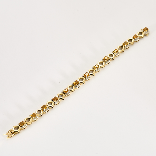 Náramek ze žlutého zlata a oranžových safírů