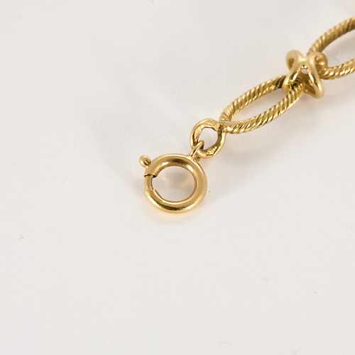 Elegant armbånd i gult gull med Ledd tvunnet design